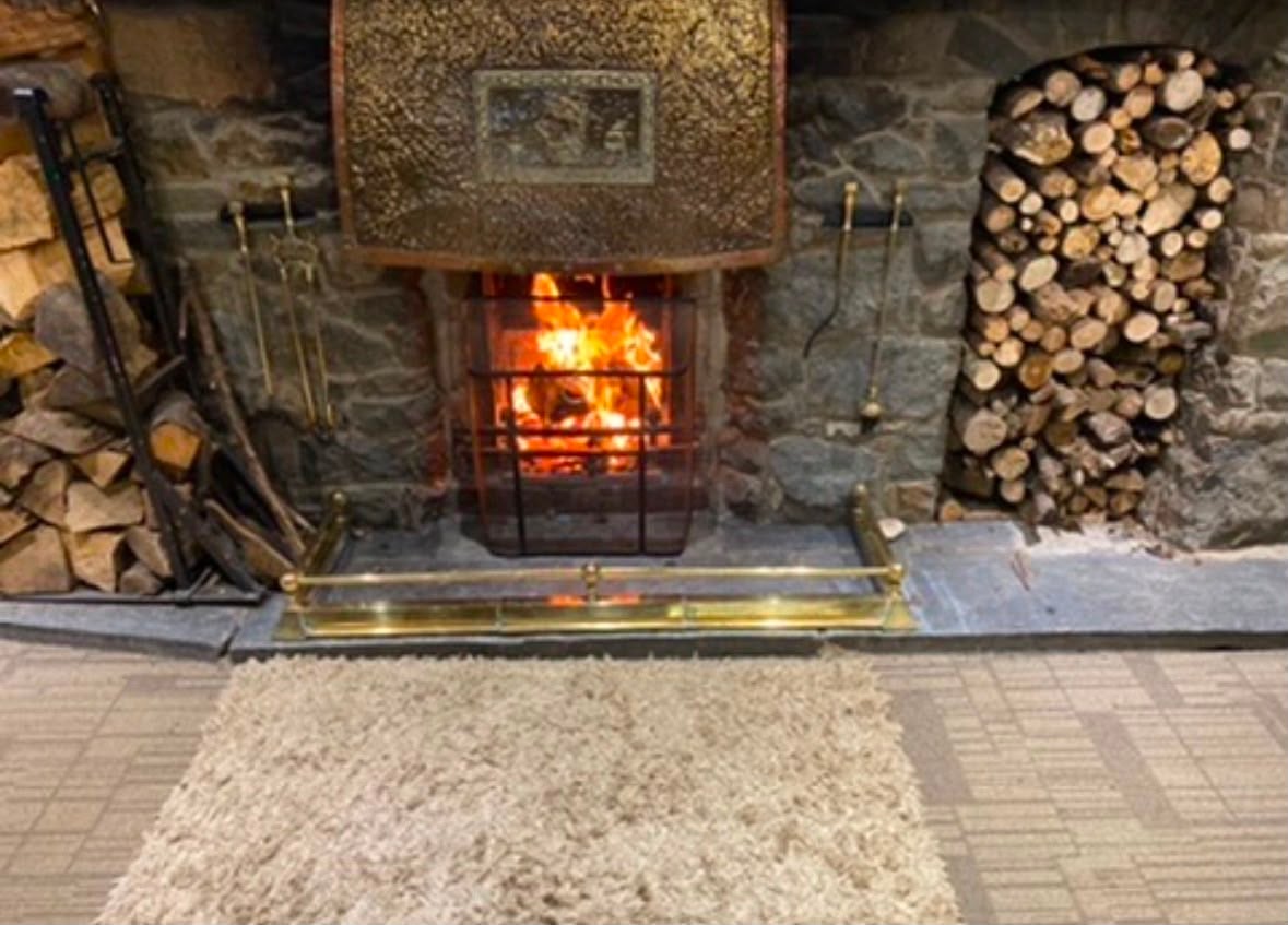 The Manor bar with an open fire